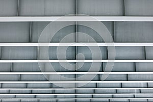 Modern architecture of minimalism building. View from under a metal construction of gray color with an even frame.