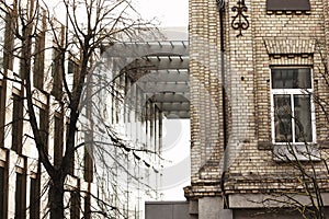 Modern architecture and old building corner with white sky