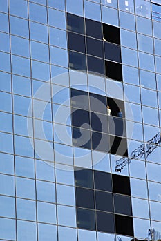 Modern architecture reflected in a downtown building in Tallinn Estonia.