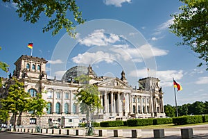 Modern architecture of Reichstag building in Berlin, Germany. Sunny summer day. Tourism in Europe