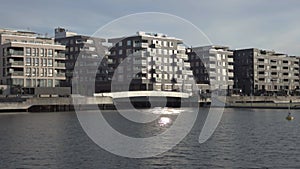 Modern architecture, residential apartments in Oslo, buildings on water`s edge.