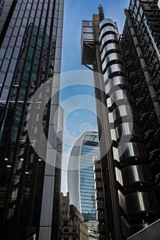Modern architecture in the UK, glass buildings rising over the city of London, architectural growth