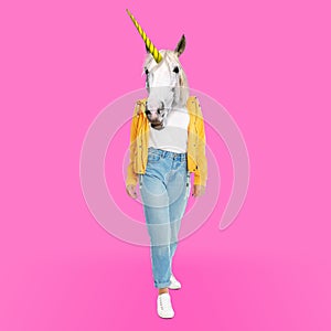 Modern art collage. Woman with unicorn`s head on pink background