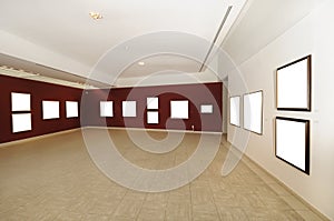 Modern art gallery space with blank canvas