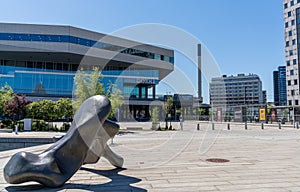 Modern art sculpture and the landmark Dokk 1 building on the harbor front in Aarhus