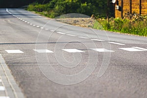 Modern asphalt road with pedestrian crossing. Adherence to traffic rules_