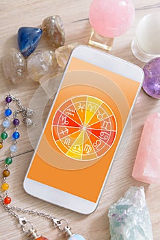 Modern astrology concept with mobile