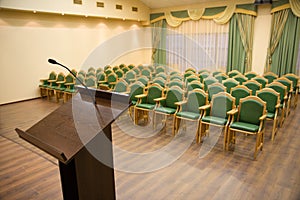 Modern auditorium hall with tribune photo