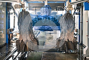 Modern automatic Carwash with blue Brushes