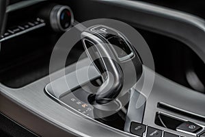 Modern automatic gearbox. Close up of the gearbox transmission handle.