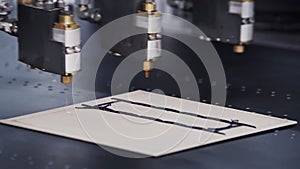 Modern automatic machine line of cardboard box. Offset printing machine - spraying glue. Conveyor line for the
