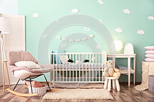 Modern baby room interior with crib