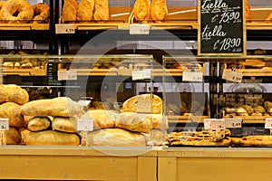 Modern bakery with a great assortment of bread, cakes and buns