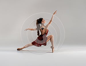 Modern ballet dancer, ballerina performing art jump with empty copy space background, izolated