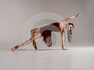 Modern ballet dancer, ballerina performing art jump with empty copy space background, izolated