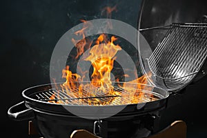 Modern barbecue grill with burning fire