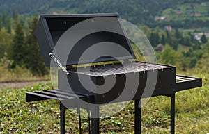 modern barbeque grill with mountain view with copy space