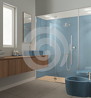 Modern bathroom in blue and wooden tones, concrete tiles floor, large shower with tiles and spotlight, washbasin with mirror,