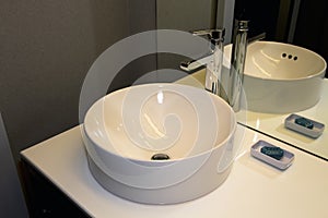 Modern Bathroom Bowl Sink, Faucet, and Counter photo