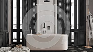 Modern bathroom in dark tones in classic apartment with window with shutters and parquet. Freestanding bathtub, pouf with