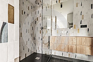 Modern bathroom with frameless mirror, one-piece white porcelain
