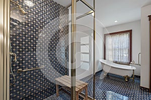 Modern bathroom with a glass-walled shower area photo