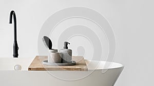 Modern bathroom interior with bathtub and water tap