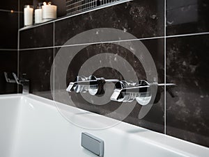 Modern bathroom interior with bathtub and water tap. Closeup view of tray with hairbrush, soap in bottle dispenser and