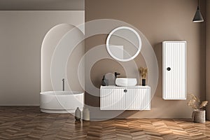 Modern bathroom interior with beige walls, white basin with oval mirror, bathtub and parquet floor. Minimalist beige bathroom with