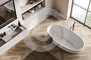 Modern bathroom interior with ceramic bathtub, double sink, mirror. White walls, hardwood flooring. Panoramic window. Top view. 3d
