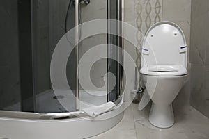 Modern bathroom interior with clean toilet bowl