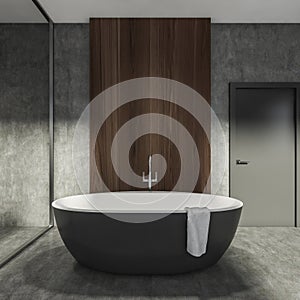 Modern Bathroom interior in new luxury home. Stylish hotel room. Open space area. Concrete wooden walls and floor. Big black