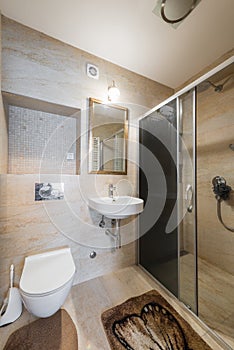 Modern bathroom interior with shower cabin