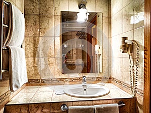 Modern bathroom interior with sink and mirror. Modern Bathroom Interior With Marble Sink and Wall Mirror