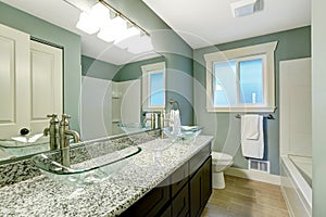 Modern bathroom interior in soft aqua color