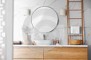 Modern bathroom interior with stylish mirror and sink