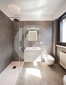 Modern bathroom with large tiles