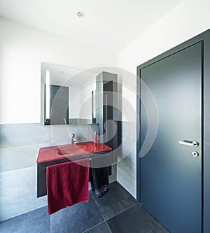 Modern bathroom with large tiles