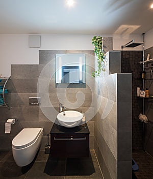 Modern bathroom with large tiles