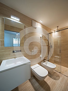 Modern bathroom with light marble i