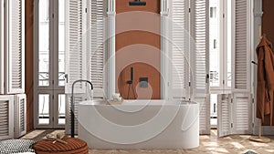 Modern bathroom in orange tones in classic apartment with window with shutters and parquet. Freestanding bathtub, pouf with