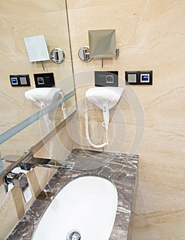 Modern bathroom sink equipment with hairdryer and remote control