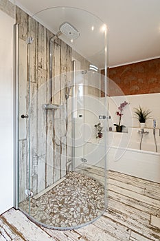 Modern bathroom in vintage style with round glass shower