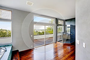 Modern bathroom with walkout deck