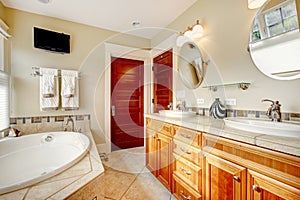 Modern bathroom with whirpool and tv