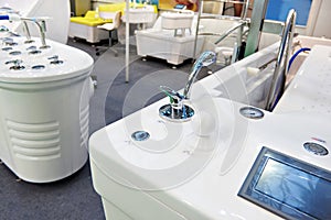 Modern bathtubs and jacuzzi in store