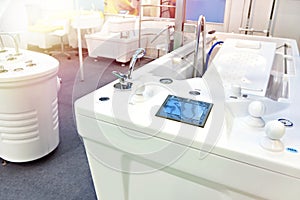 Modern bathtubs and jacuzzi in store