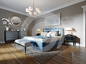 A modern bedroom in an eclectic style. With a double blue bed, black dressing table and chest of drawers with decor. beige walls