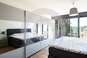 Modern bedroom with furniture, elegant and luxurious