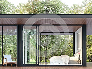 Modern bedroom in glass house surrounded by a large green garden 3d render